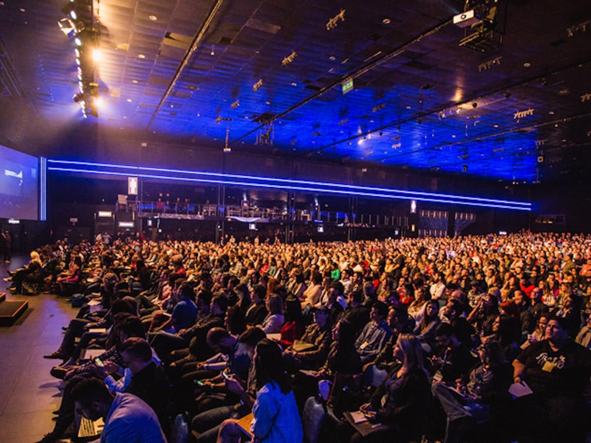 Event professional reviewing a venue setup